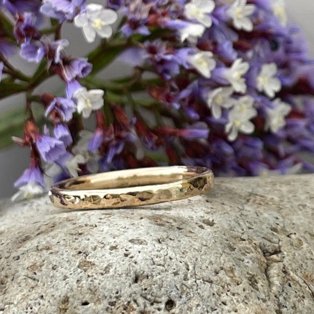 14k yellow gold cremation ring with hammered finish 2.5mm width.   Unique and handmade gold cremation ring is discreet, durable and water safe.