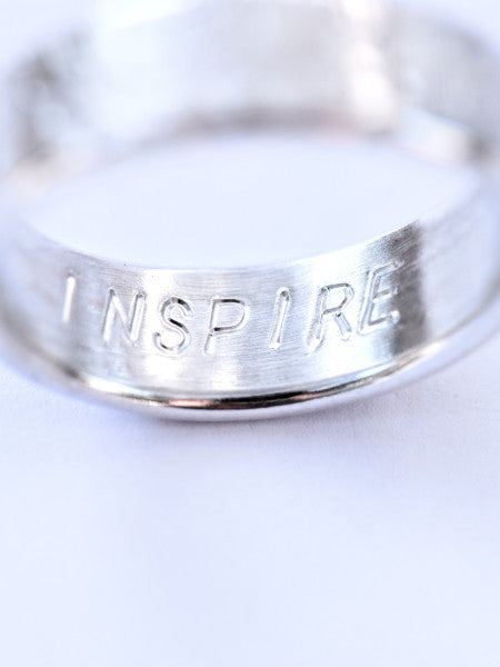 Have your cremation ring engraved for $25.  Your brushed finish ring can be engraved on the inside.    You can request a specific font. Just let me know what you would like.