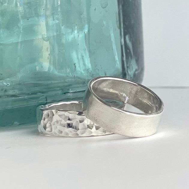 Sterling Silver Cremation rings by Outside Sol.  Each ring is hand made.  Shown here with a hammered or brushed finish.