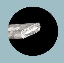 Cremation ashes are secured within sterling silver during the making of a ring