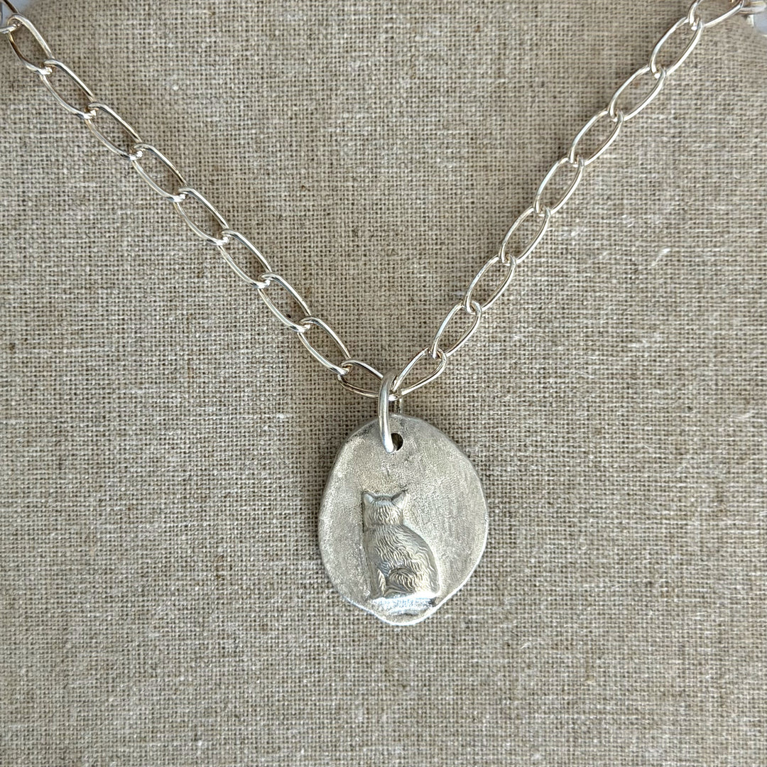Cremation Jewelry cat pendant in sterling silver.   Hand made with unique organic shape.