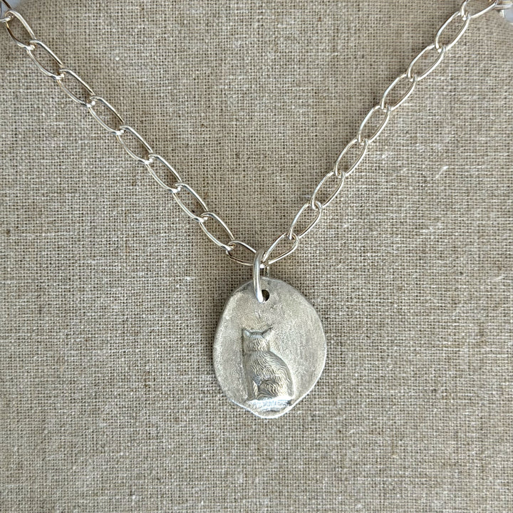 Cremation Jewelry cat pendant in sterling silver.   Hand made with unique organic shape.