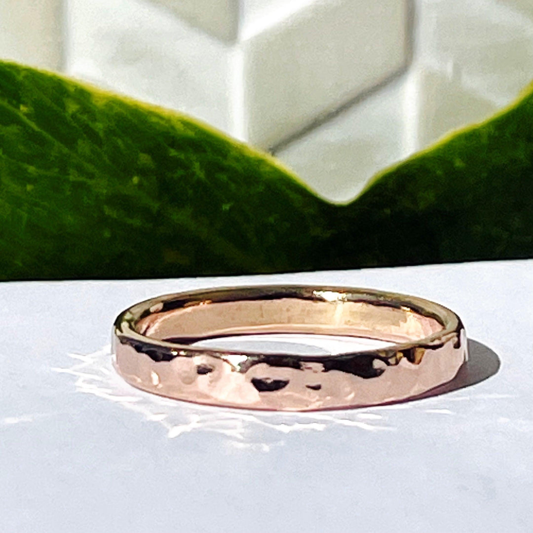 Rose gold cremation ring.  It's solid 14k rose gold (except for the cremation ash core).  Perfect for any occasion with a beautiful a hammered textured finish.  Optional inside ring engraving available.